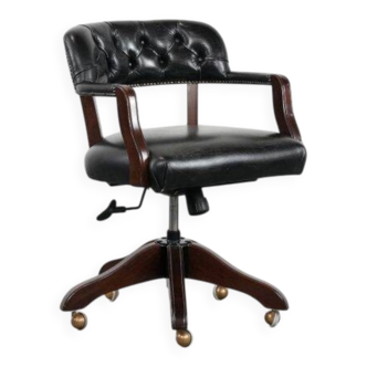 Adjustable black timeless Chesterfield office chair made of cow leather
