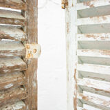 Pair of shutters louvered