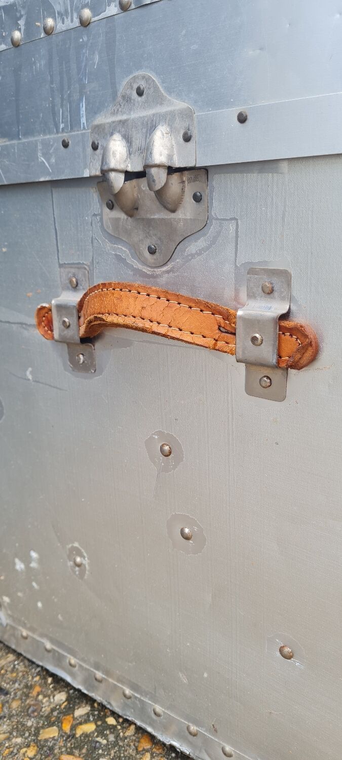 Riveted metal transport trunk