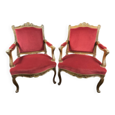Pair of flat-back armchairs in Louis XV style in red velvet.