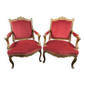 Pair of flat-back armchairs in Louis XV style in red velvet.