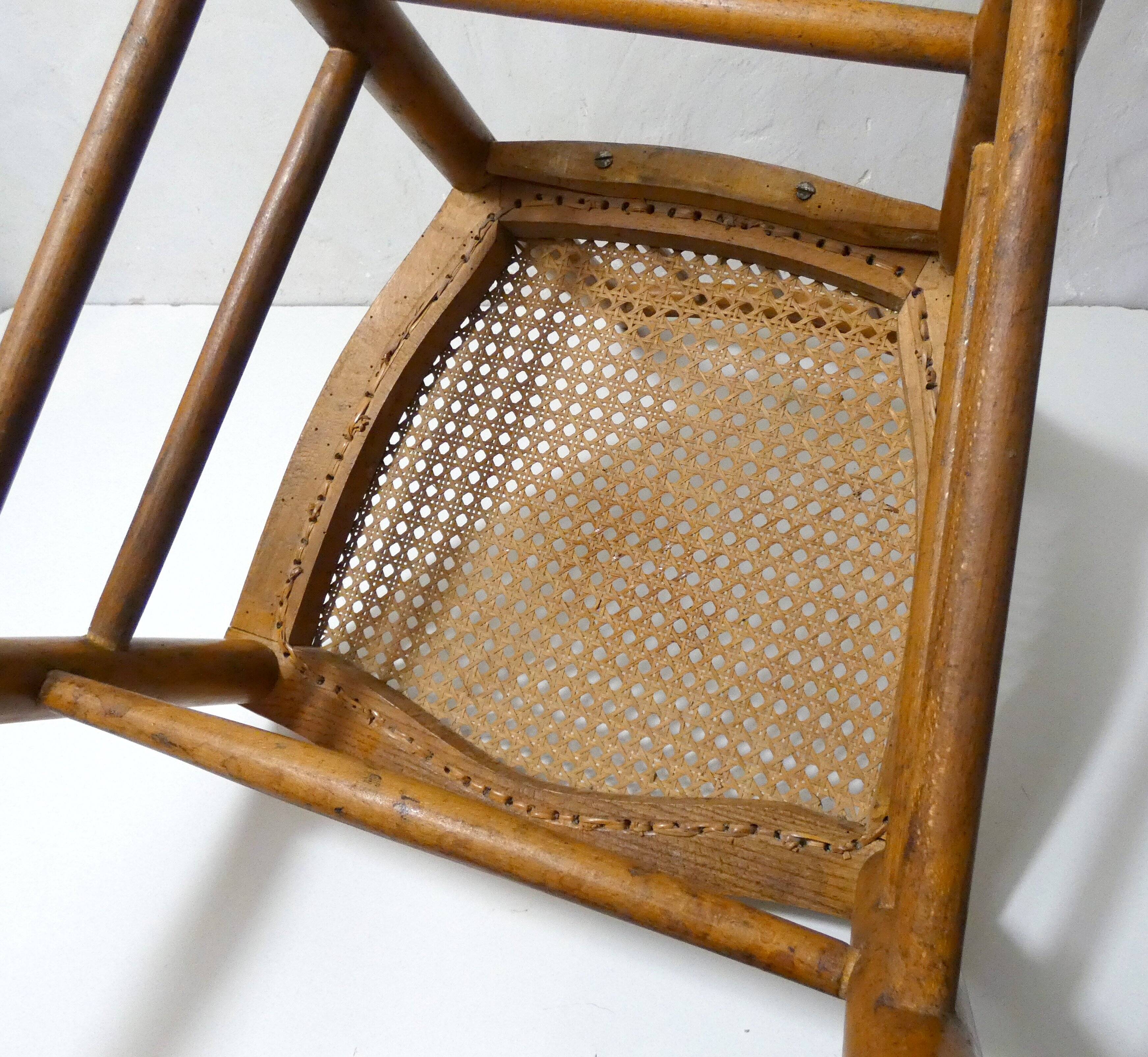 vintage wooden bistro chair with caning