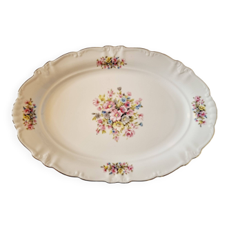 Oval dish in German Bavarian porcelain with floral decoration, reliefs and gold