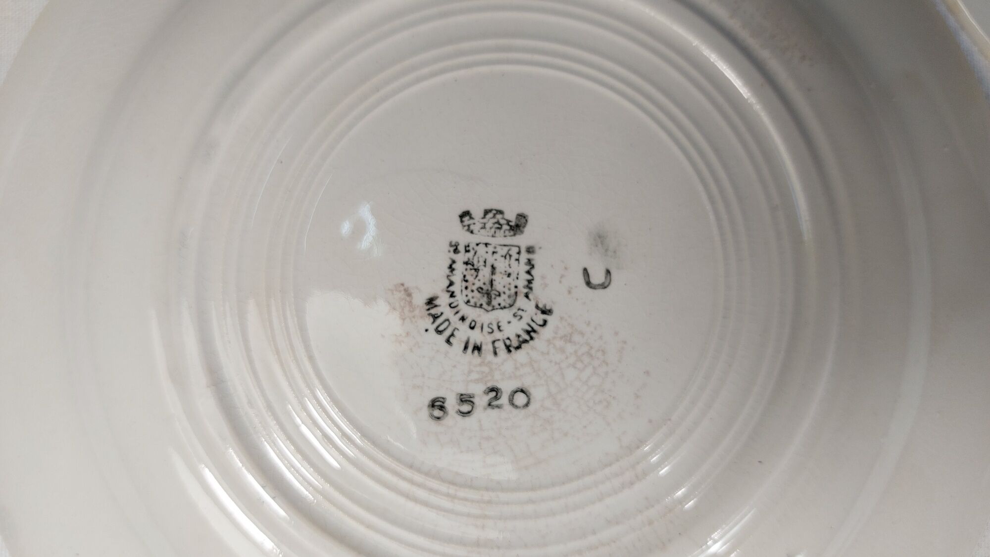 Set of 4 old flat plates from the earthenware factories of St Amand