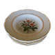 6 vintage plates with central pink