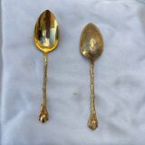 Set of golden metal spoons