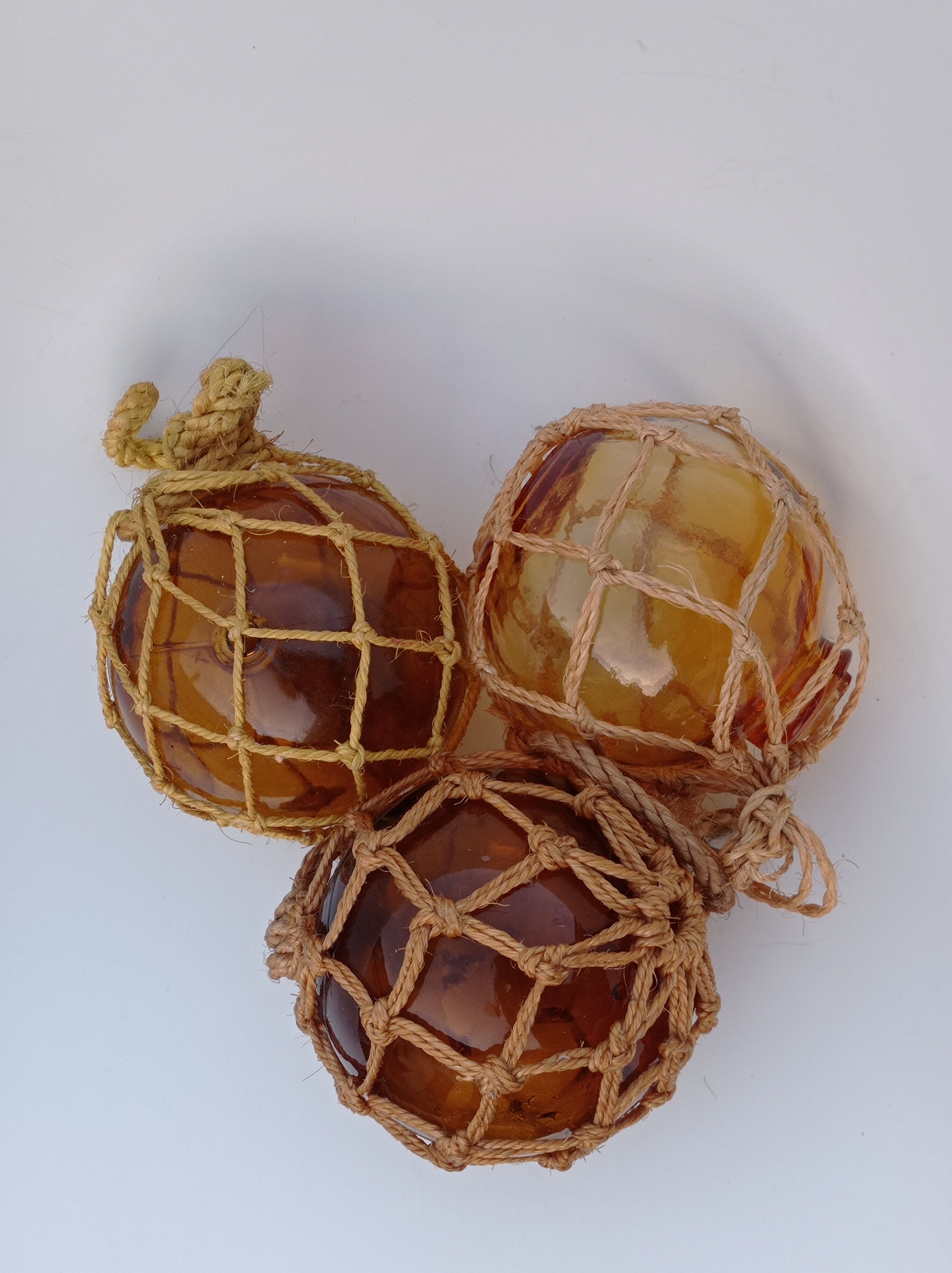 3 amber glass trawl balls