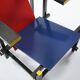 Red and blue armchair by Gerrit Rietveld for Cassina