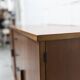 1960s teak sideboard with 4 drawers, 2 doors, and a mirror.
