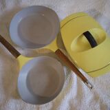 The Creuset cocotte Raymond Loewy enamelled yellow and 2 pans