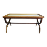 Table basse en bois sculpté patiné et doré. Maison Hirch