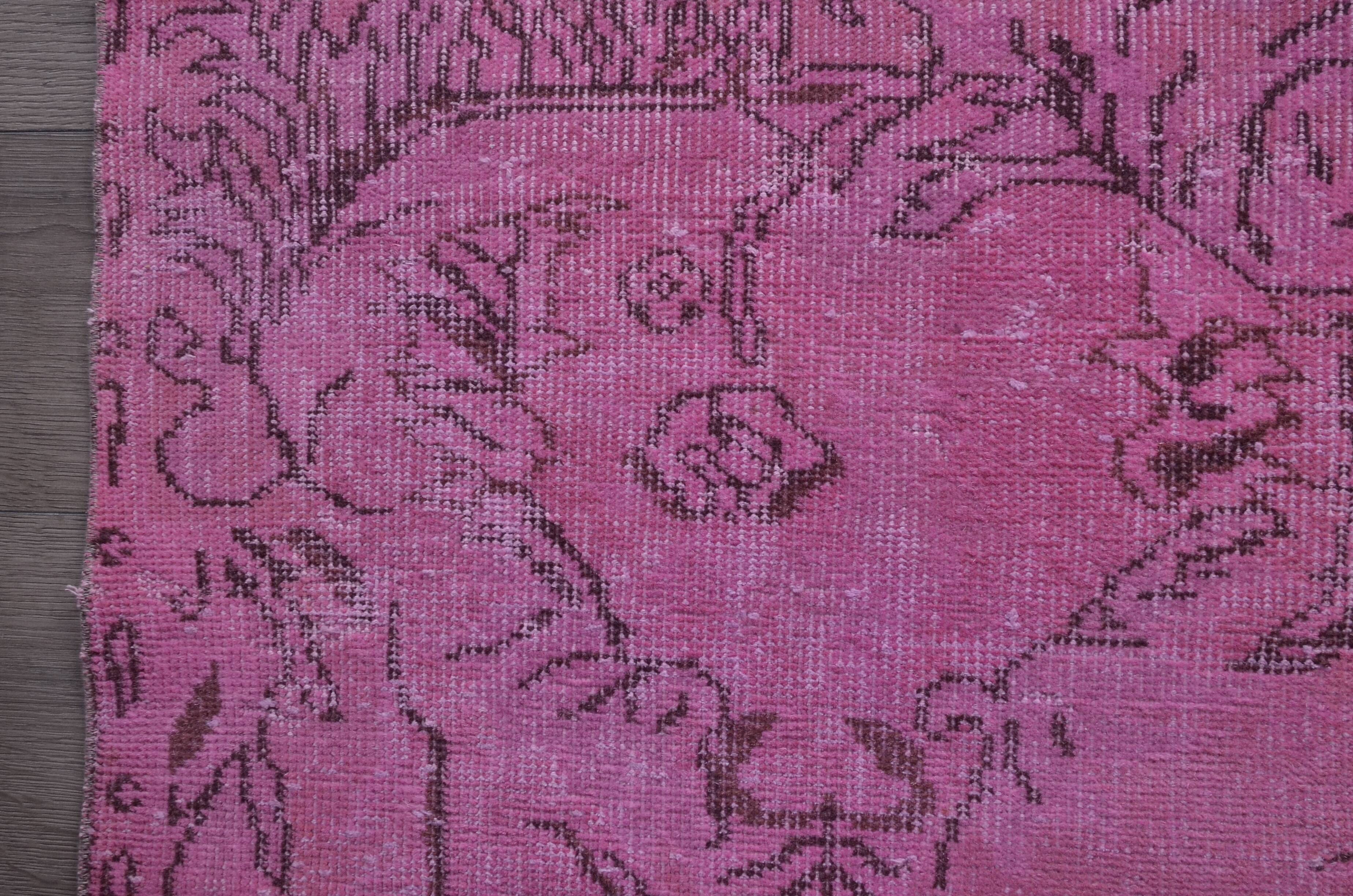 Tapis Oushak rose vintage
