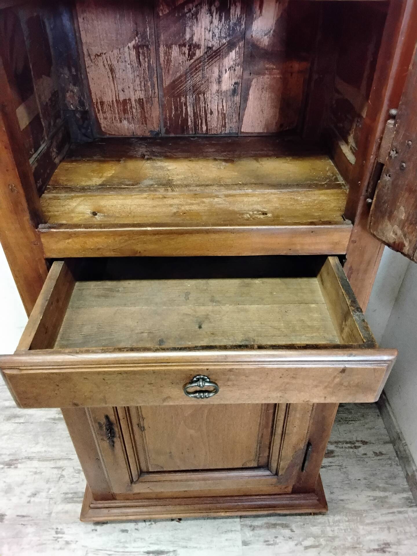 Antique wardrobe standing man