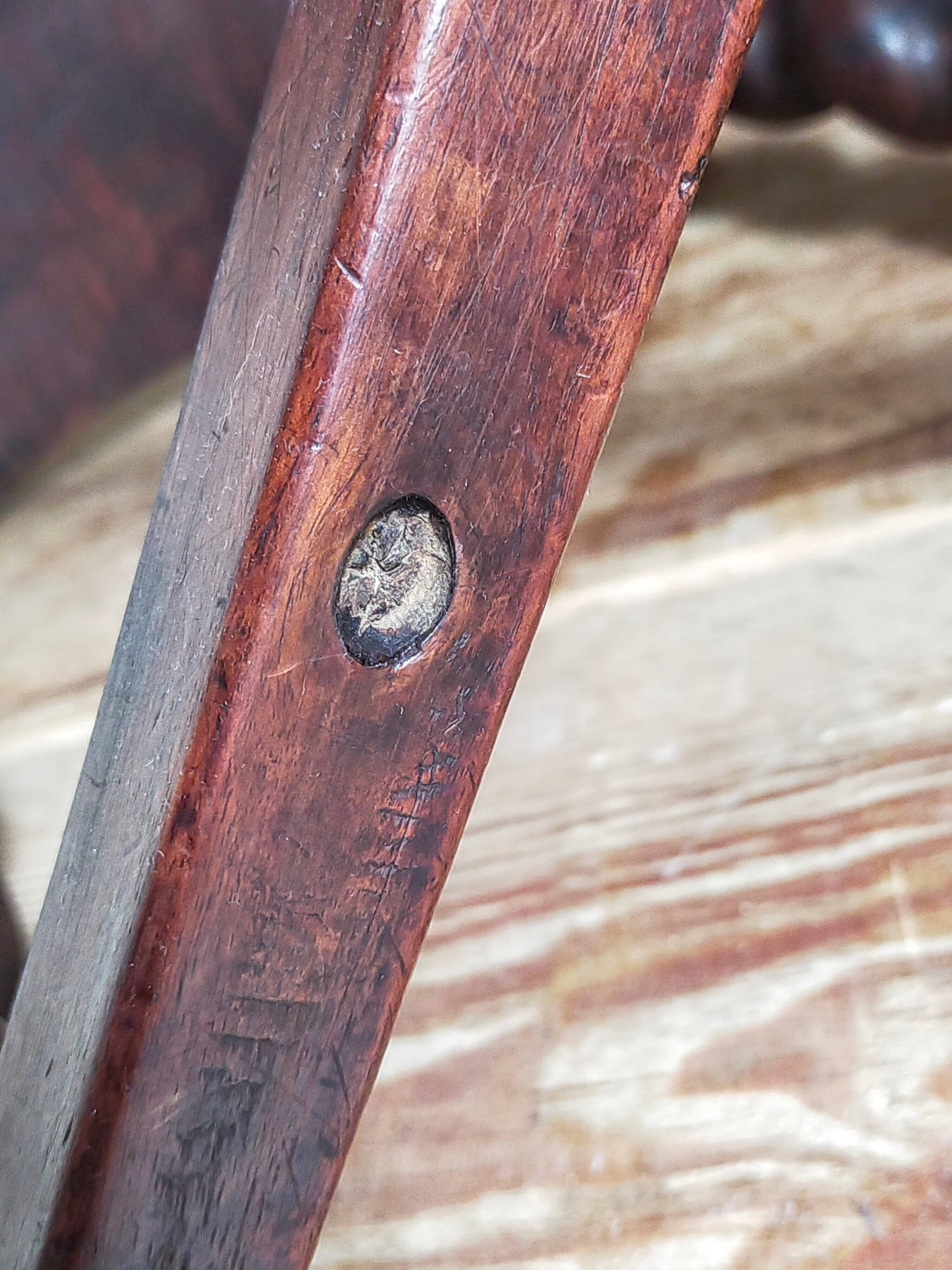 Antique stool in turned and carved solid wood
