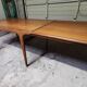 Vintage Scandinavian design table in Teak asymmetric extension by Johannes Andersen 1960