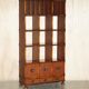 Pair of open bookshelves in crocodile leather with drawers and compartments.