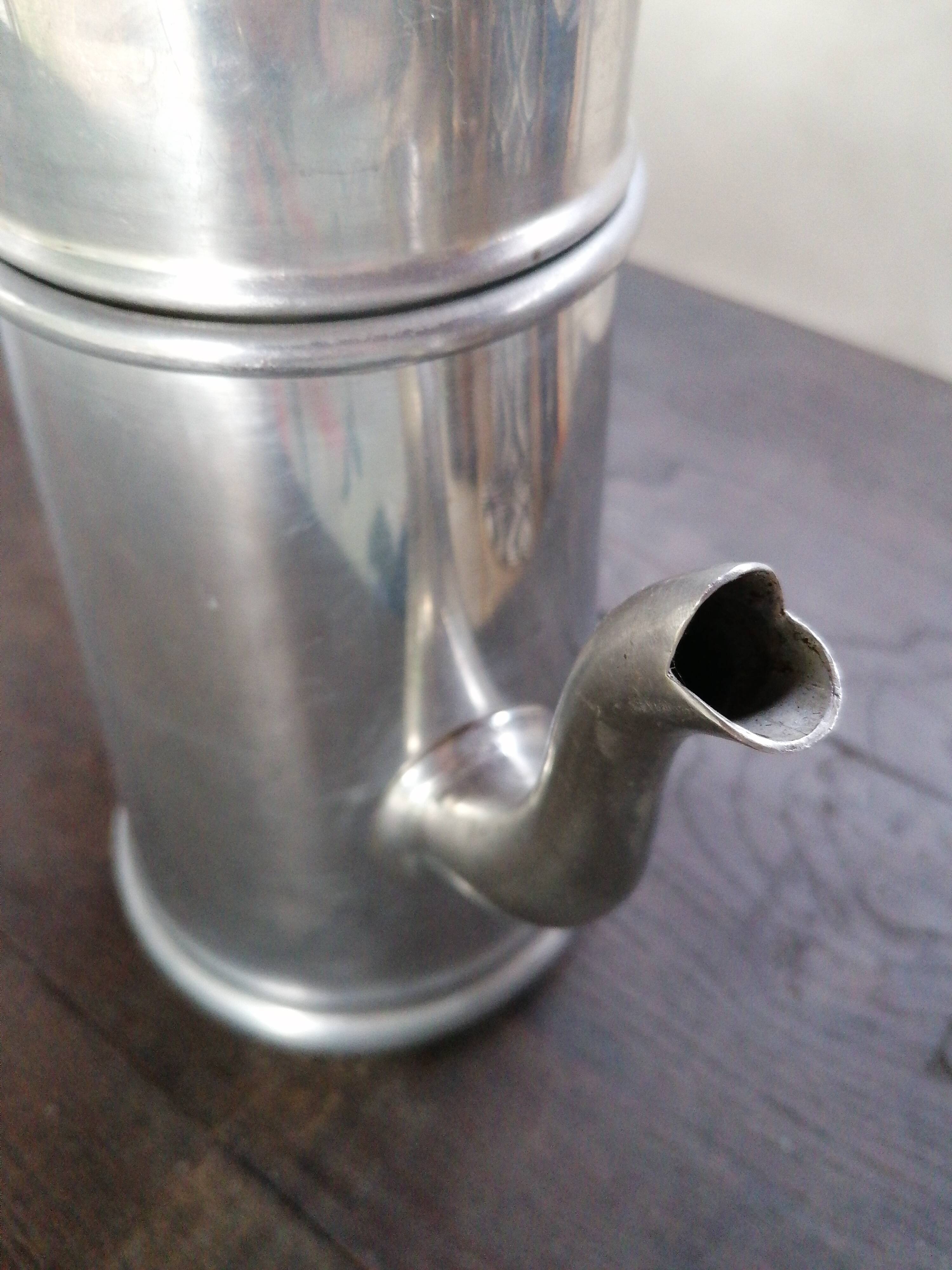 Vintage coffee maker in grey metal and bakelite handle