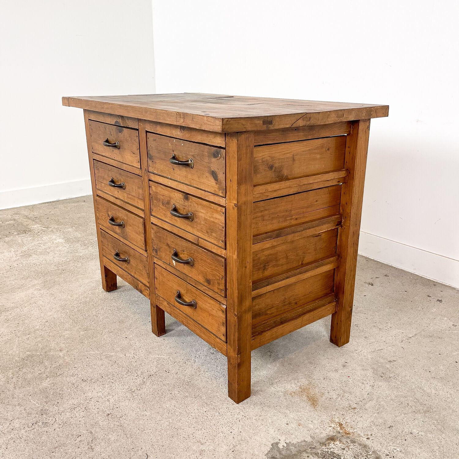 Vintage industrial wooden workbench with drawers