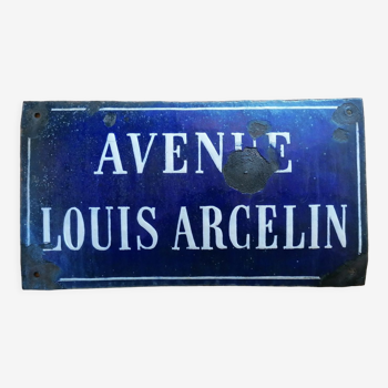 Old domed enamelled street sign