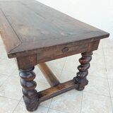 Louis XIII walnut table from the 19th century.