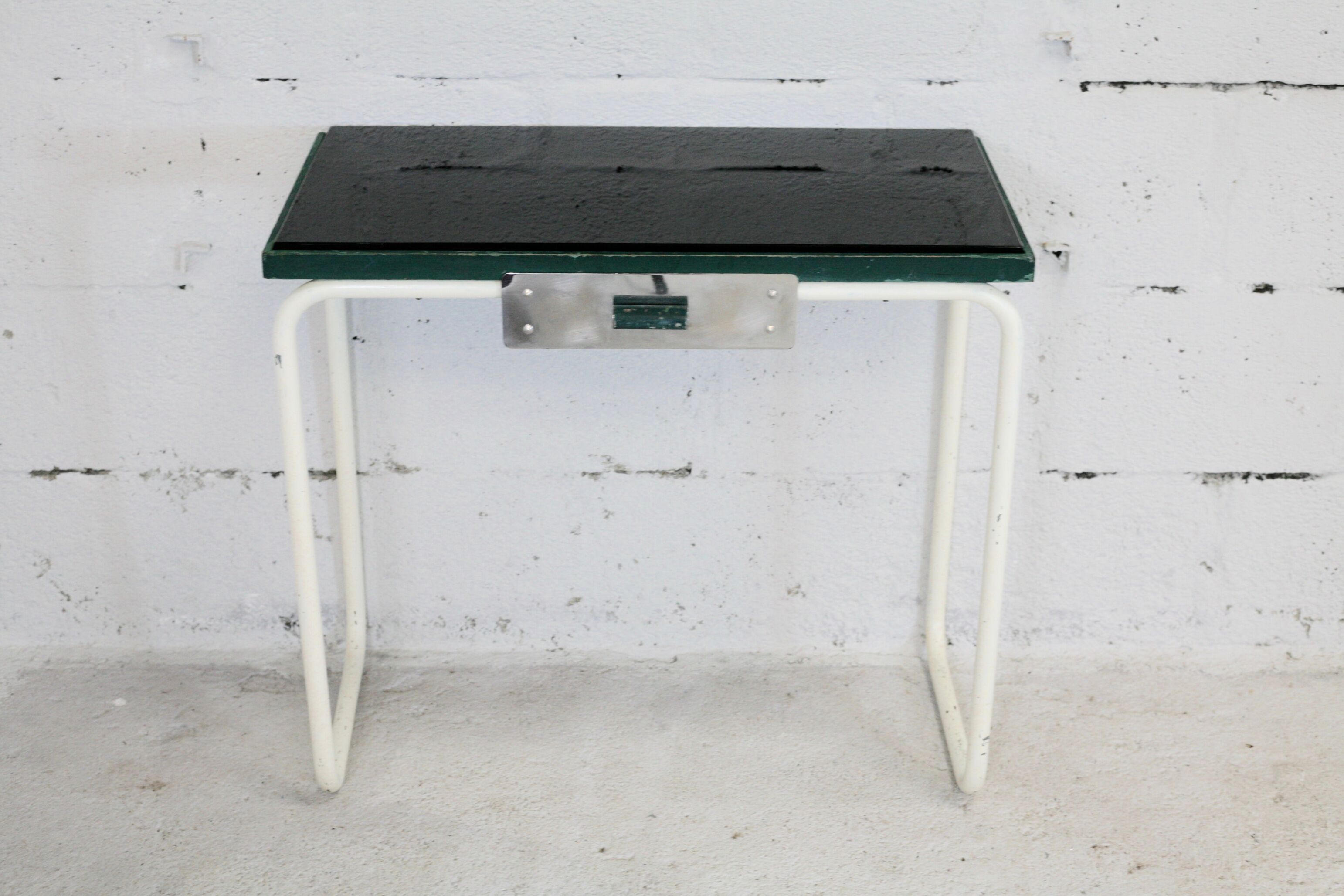 Tubular steel console, black glass tray, circa 1950