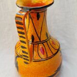 Orange ceramic pitcher from Italy