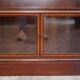 Antique pair of legal bookcases by William Baker Co in hardwood, satin and walnut.
