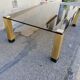 Vintage coffee table smoked glass and golden feet