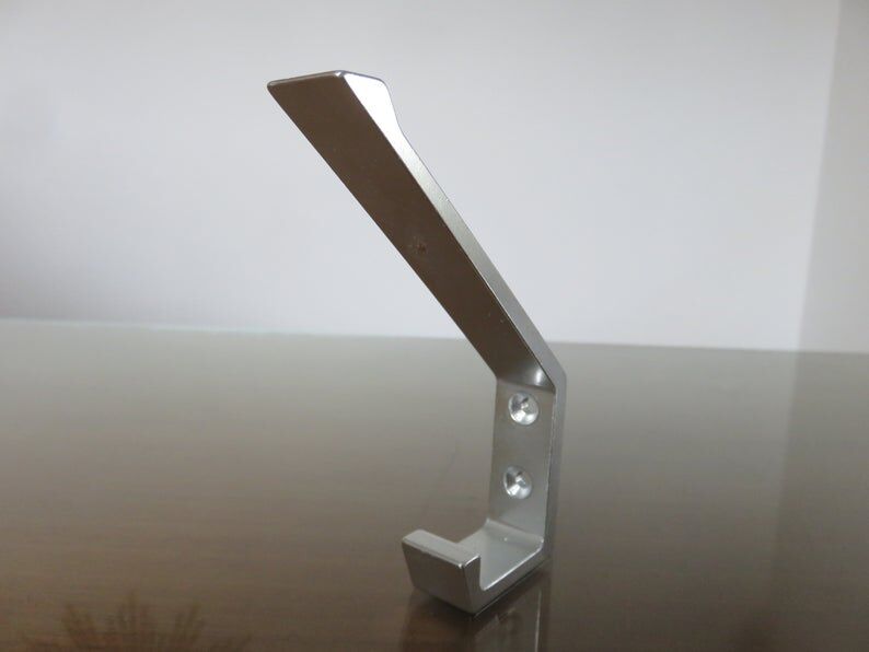 Series of 16 70s aluminium pads