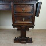 Unusual Renaissance style center desk made in the mid-19th century in walnut