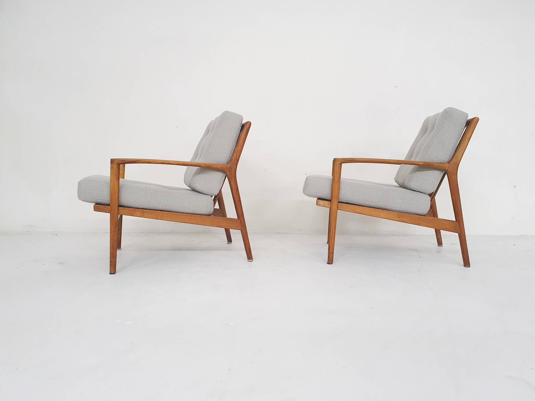 Solid oak antique dining chairs, with hand carved back rests. The chairs have no screws only wooden