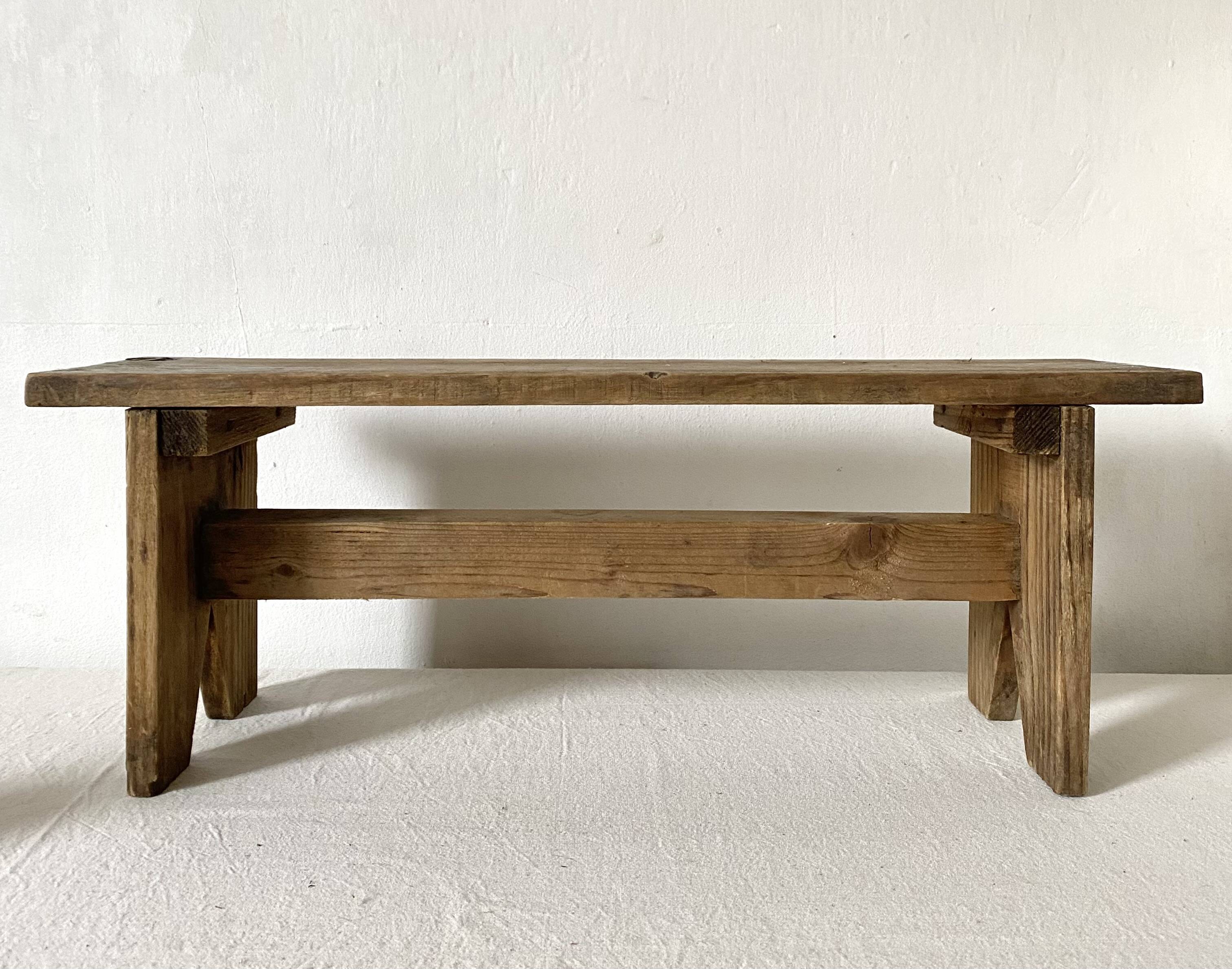 Low stool in raw wood