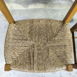 Pair of vintage wood and straw chairs