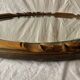 Ancien miroir ovale biseauté en bois sculpté - 69 cm