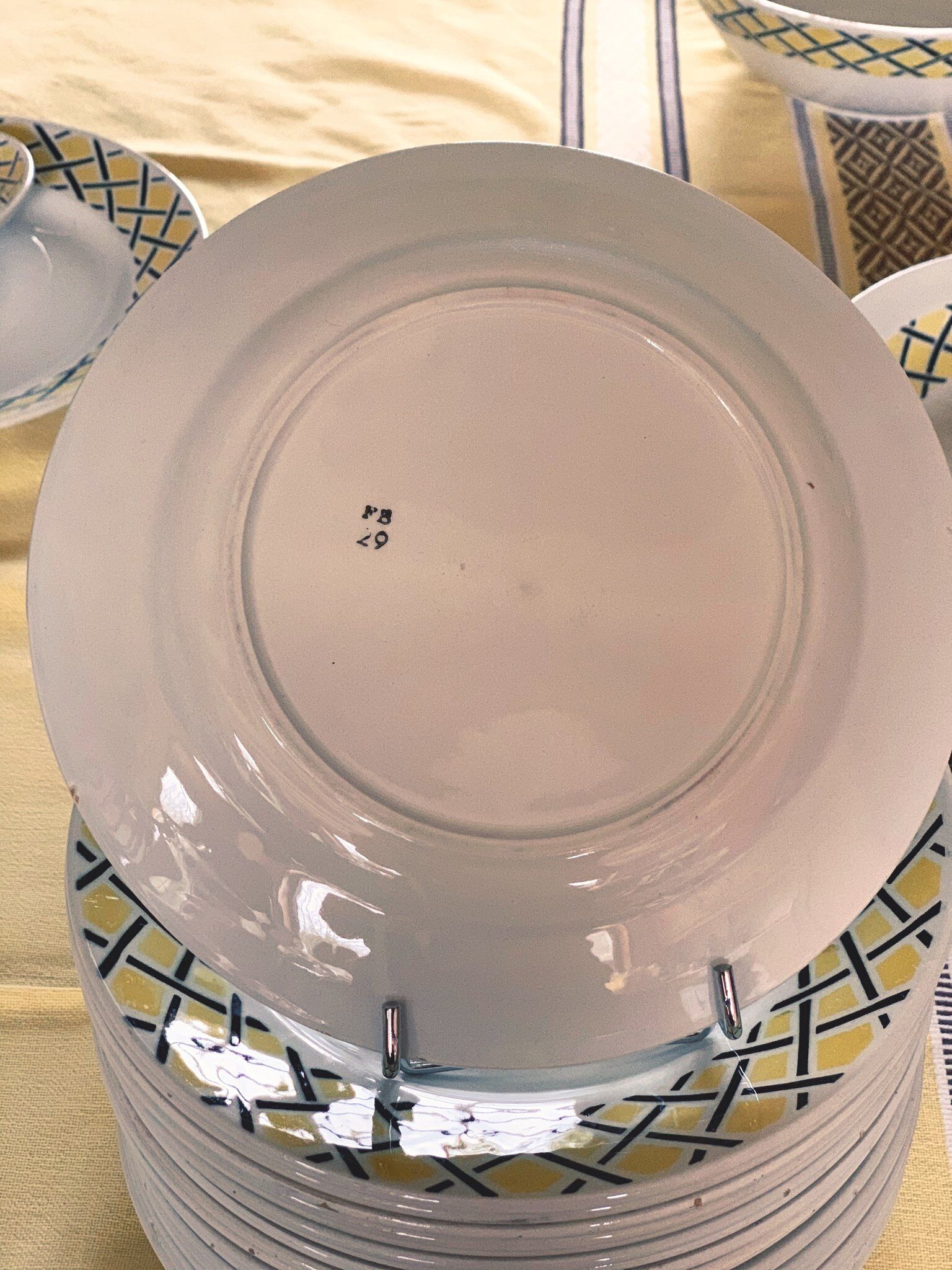 Old flat plates in 1950 Badonviller earthenware