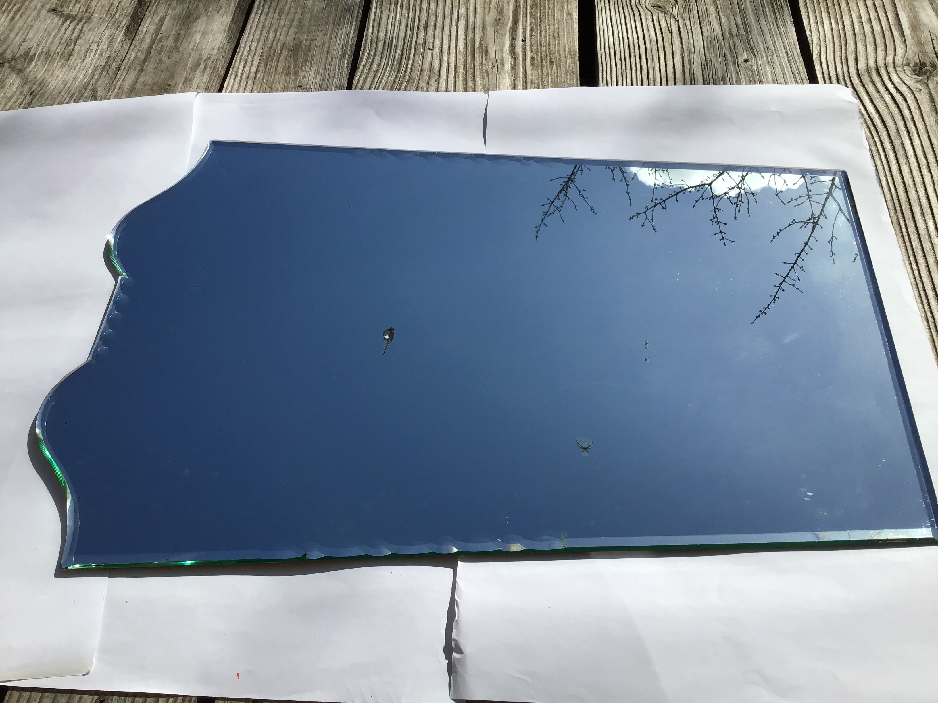 Bevelled mirror trapeze two waves at the top