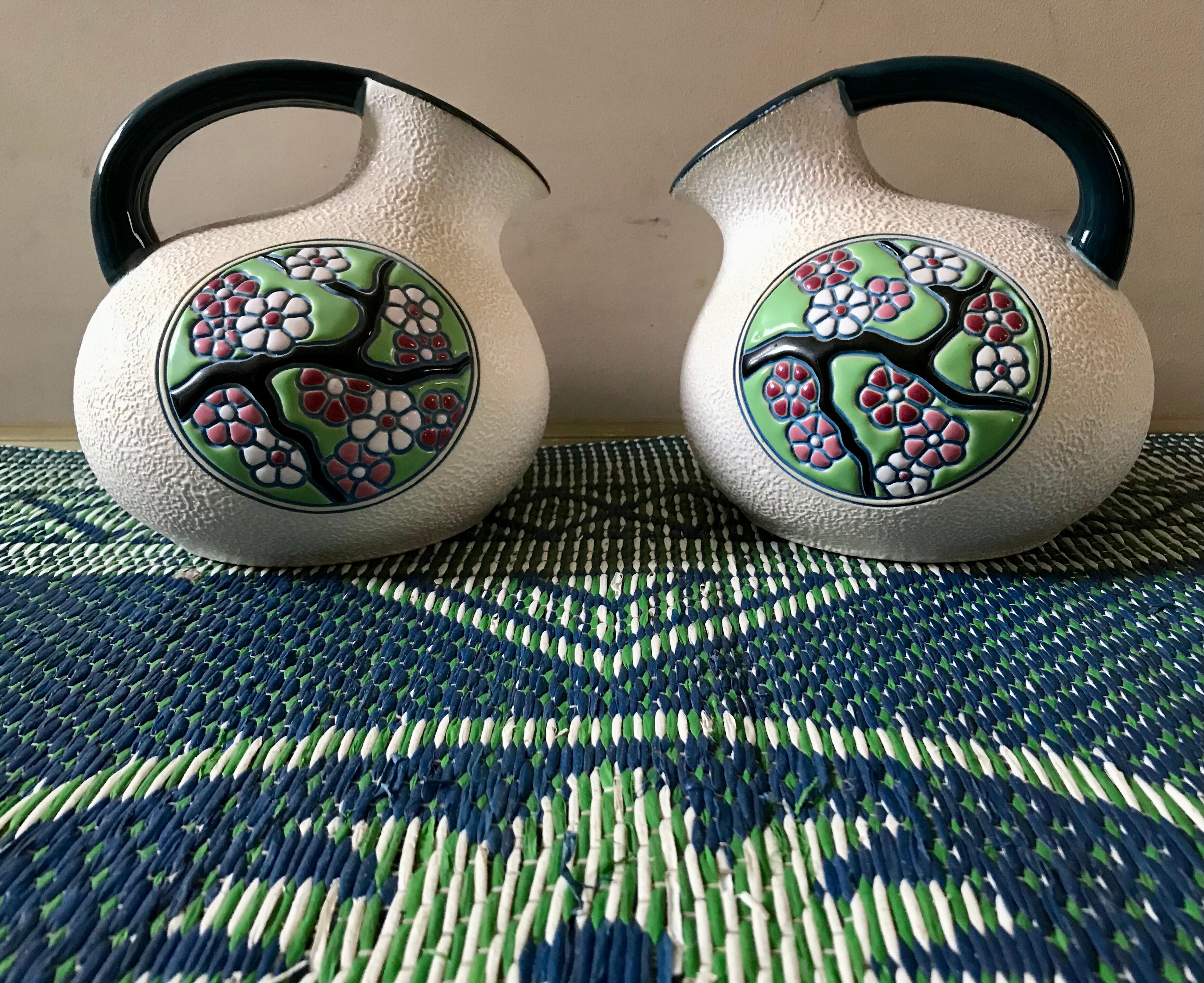 Pair of art deco pitchers