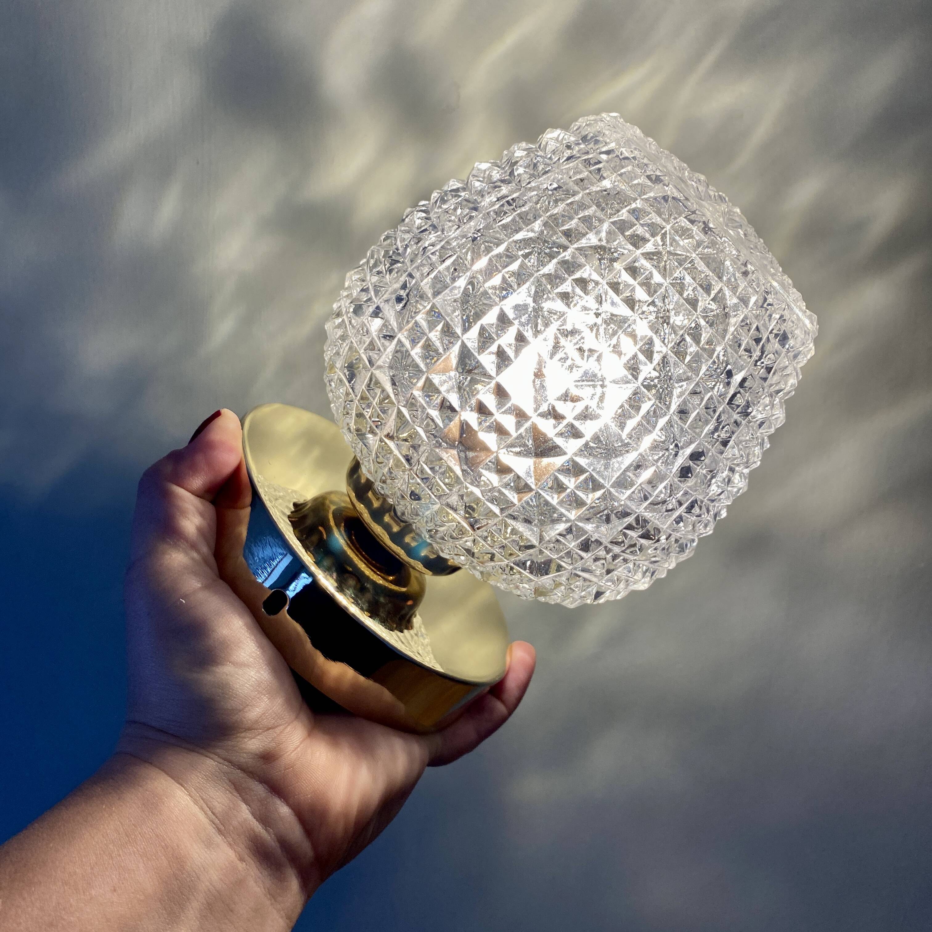 Vintage glass globe wall or ceiling light with diamond point.