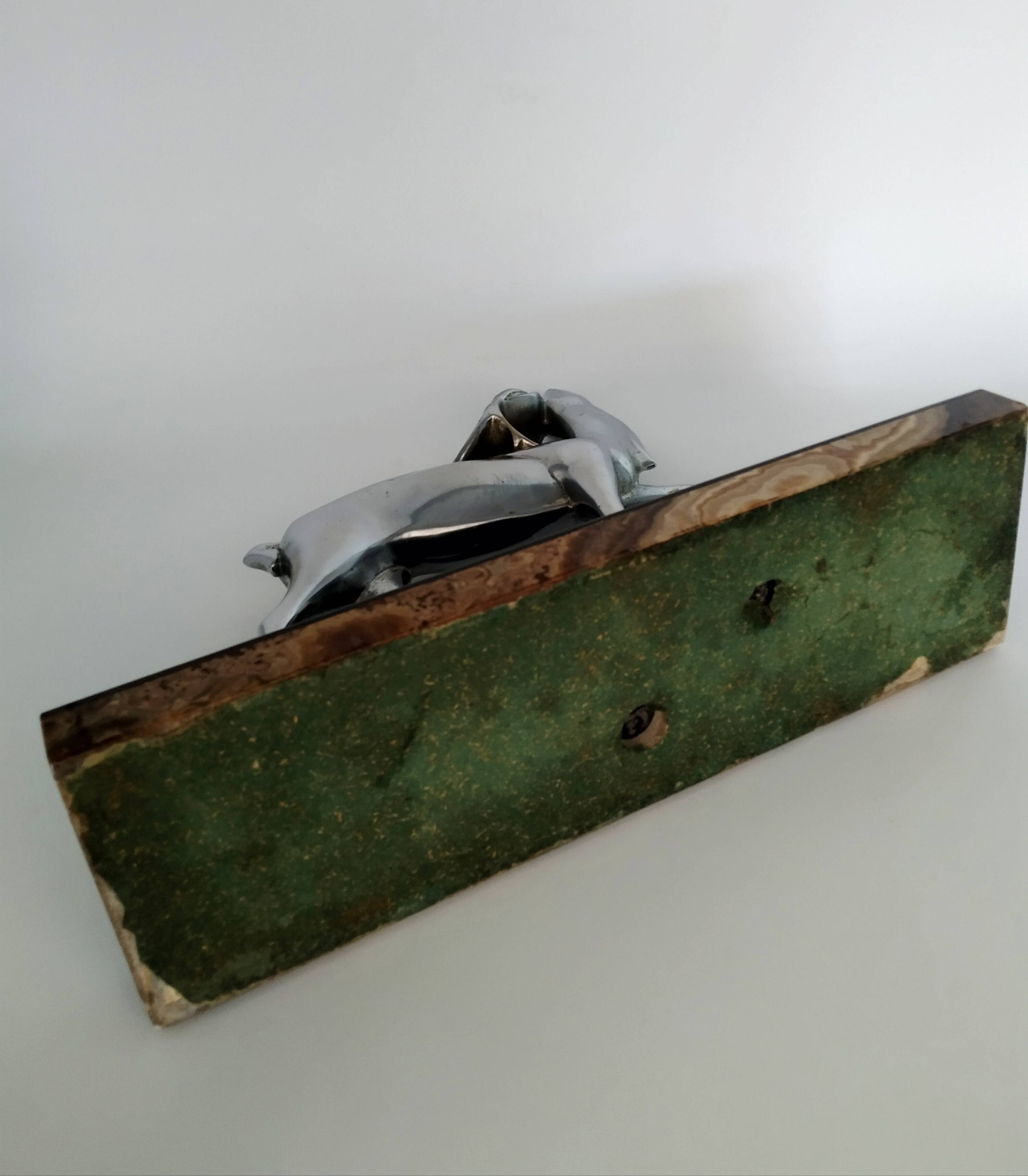 Silvered bronze sculpture signed by Michel Decoux.