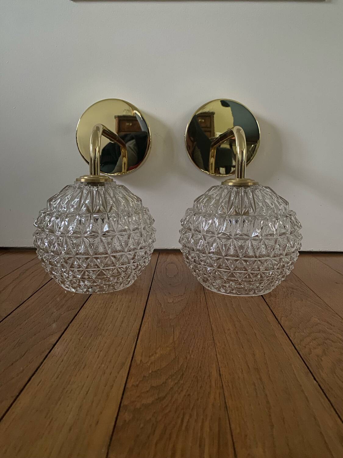 Pair of wall lights with vintage globes