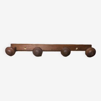 Old coat rack with 4 vintage wooden hooks