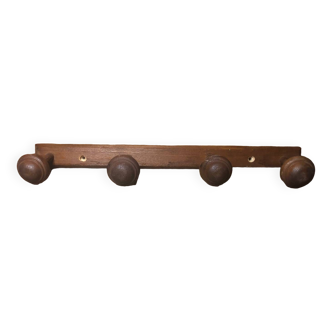 Old coat rack with 4 vintage wooden hooks