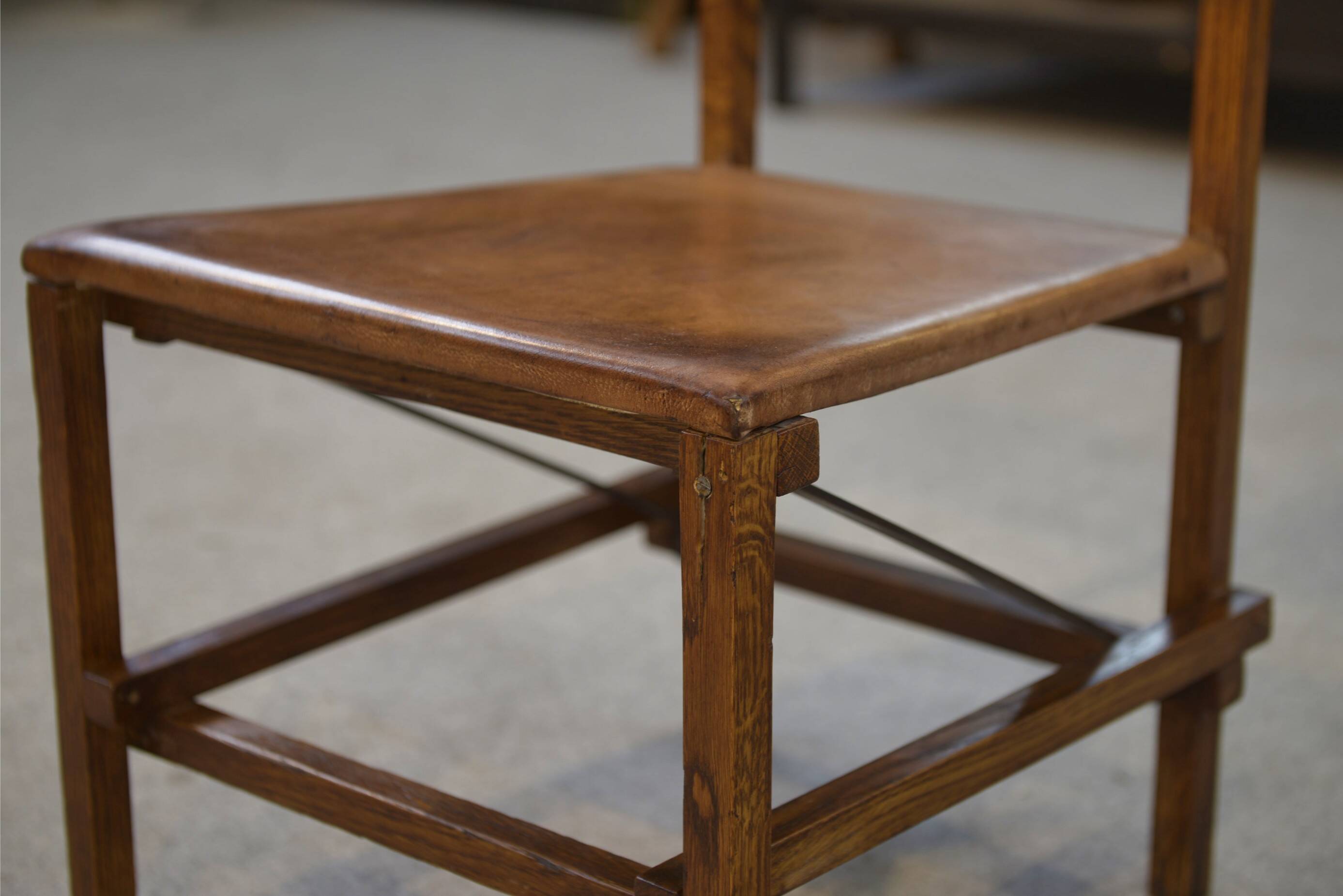 Pair of oak and leather chairs in the style of Gerrit Rietveld 1960s.