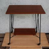 Tv furniture, a table with teak wheels and Scandinavian-style metal.