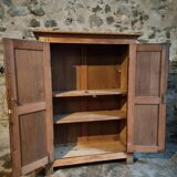 Antique French wardrobe in oak and pine, late 19th century.