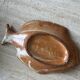 Decorative ceramic plate in the shape of a fish from the 1970s.