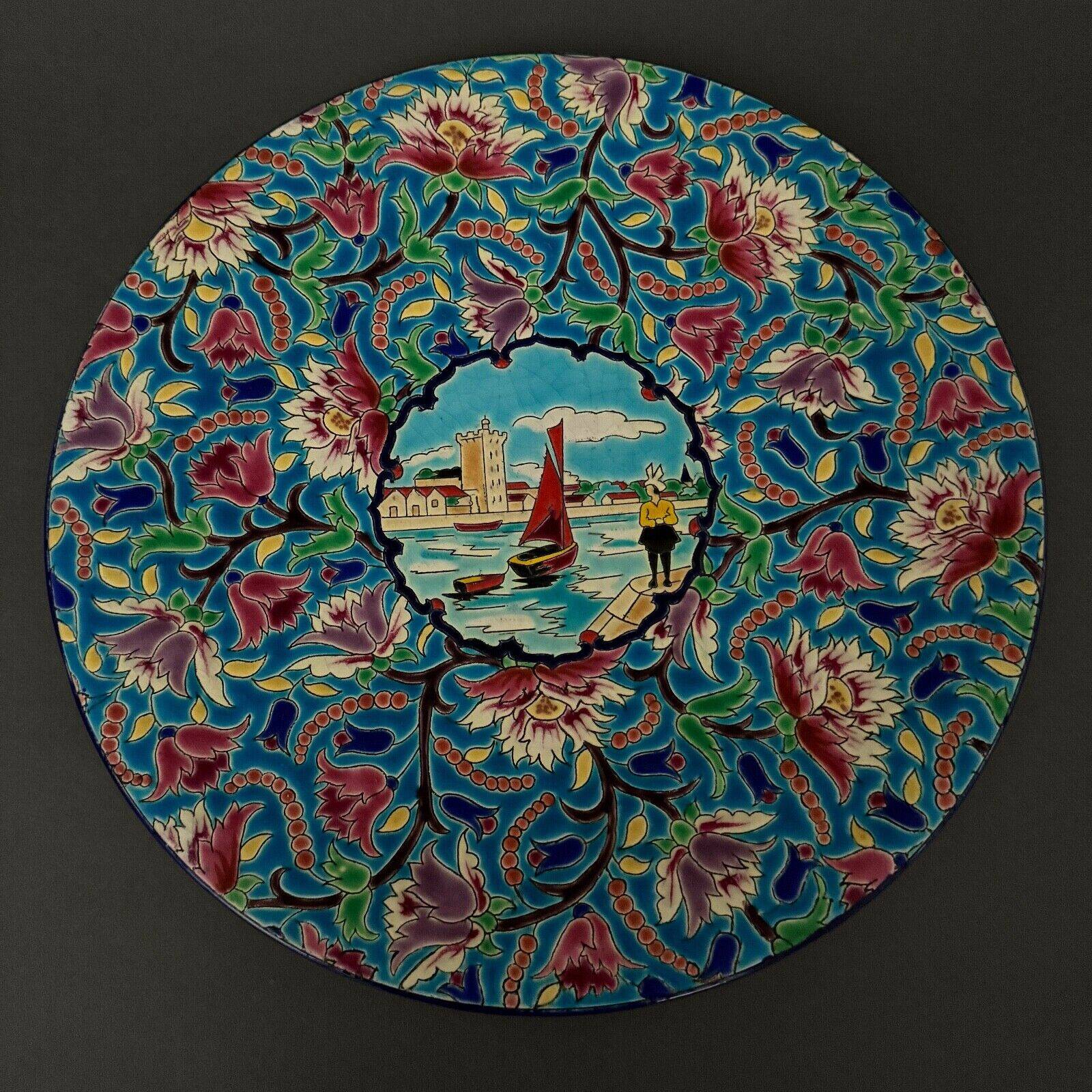Longwy enamel dish decorated with a port scene