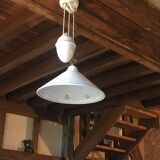 Sliding suspension chandelier with counterweight and smooth openwork plate