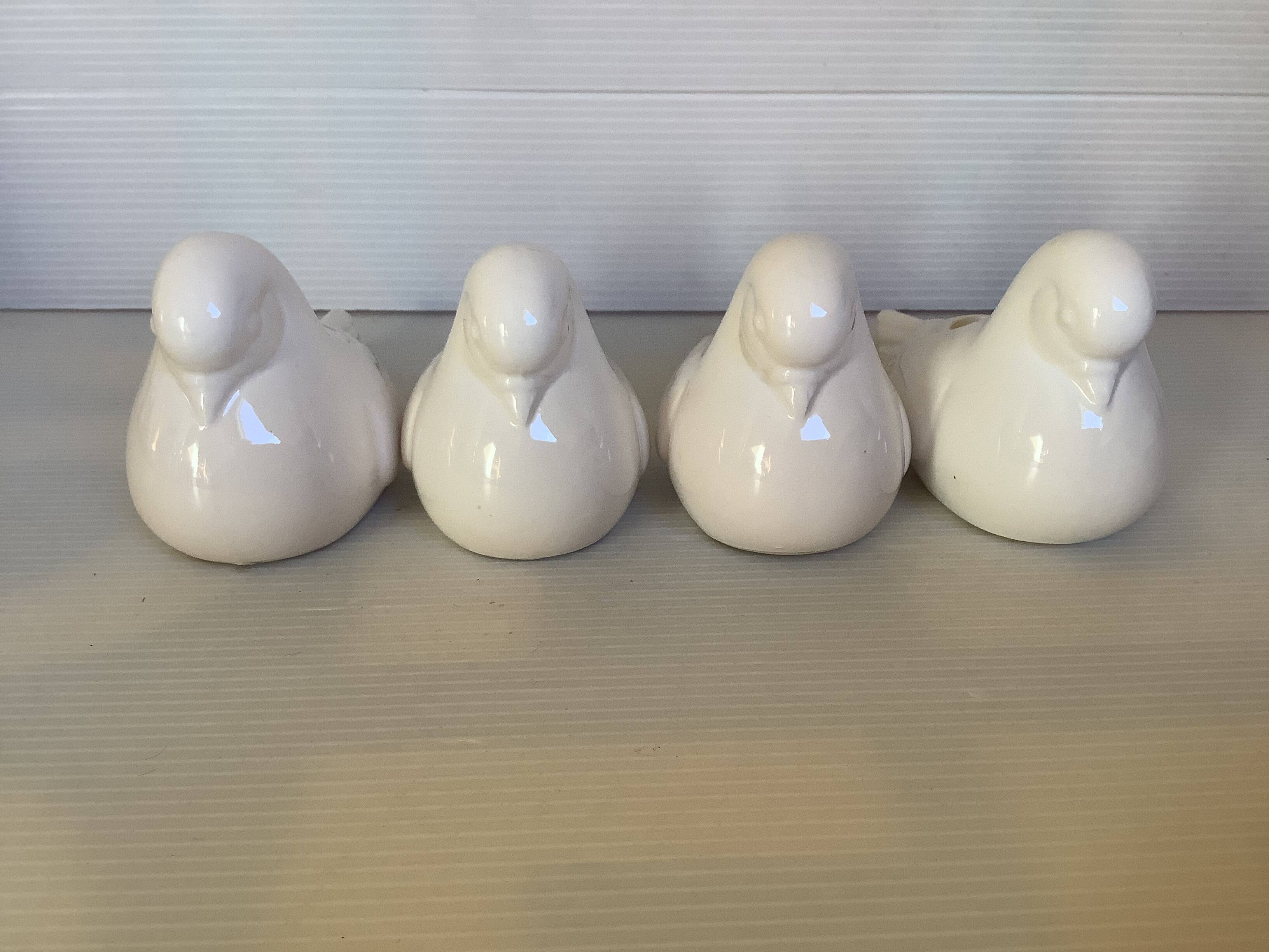 Seven dove bird candle holders