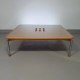 Rare coffee table 110 x 110 x height 35 cm with 8 flange wooden / cork caps in the glass top.